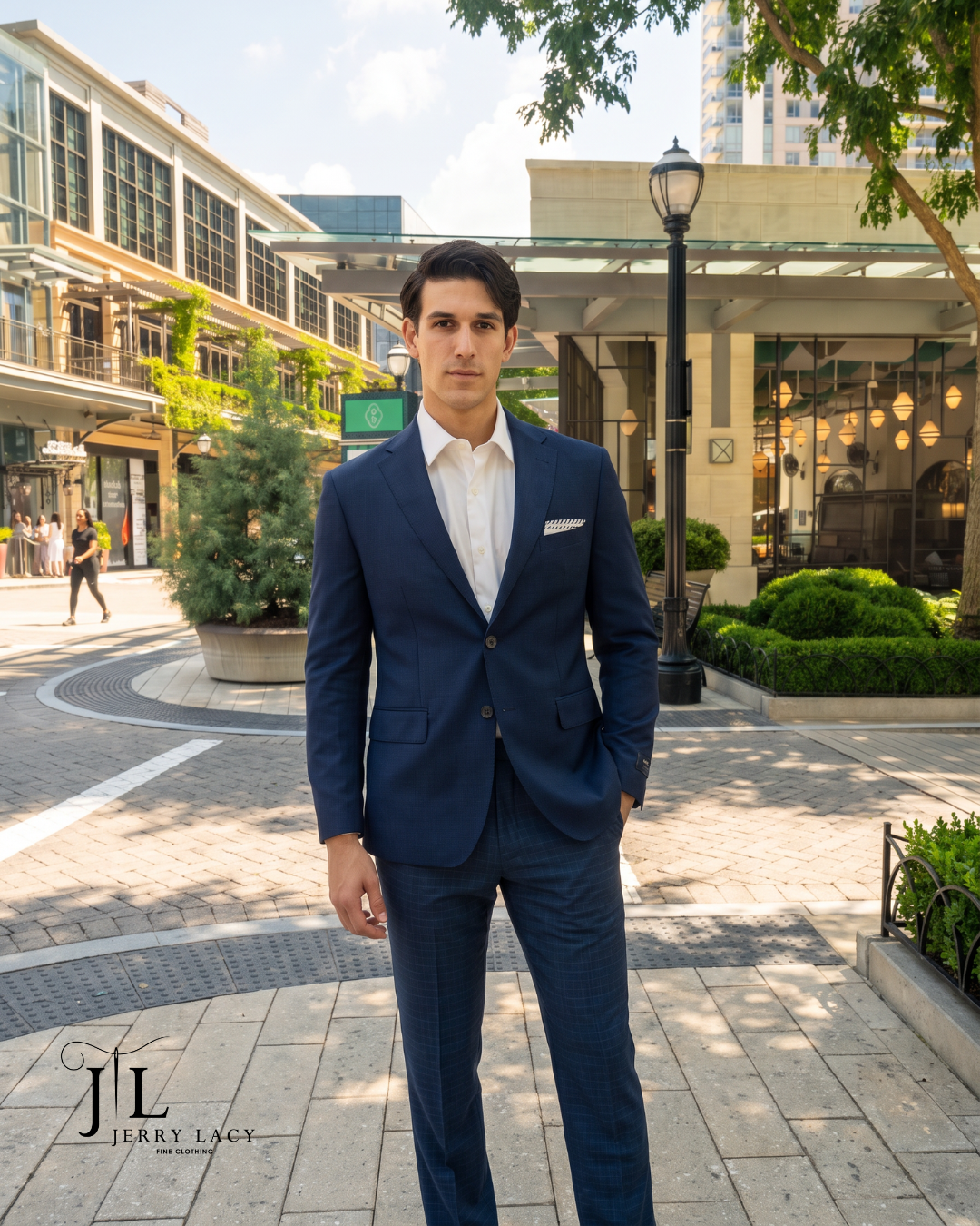 Navy suit with checked trousers in Buckhead village