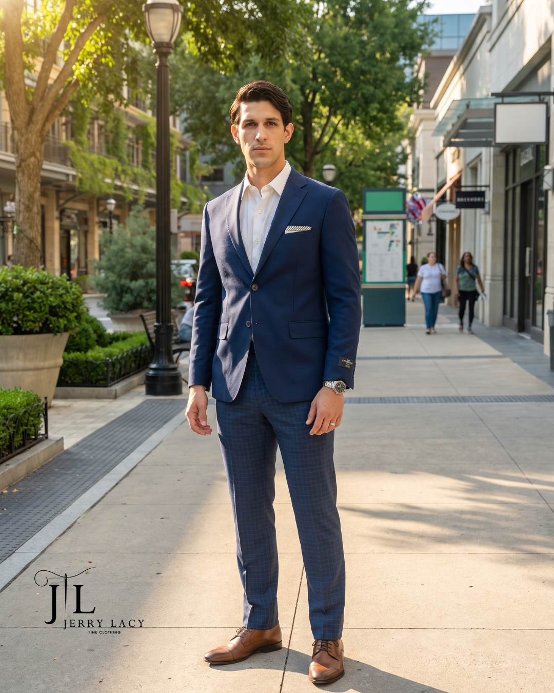 Navy suit with white shirt and pocket square, brown derbies